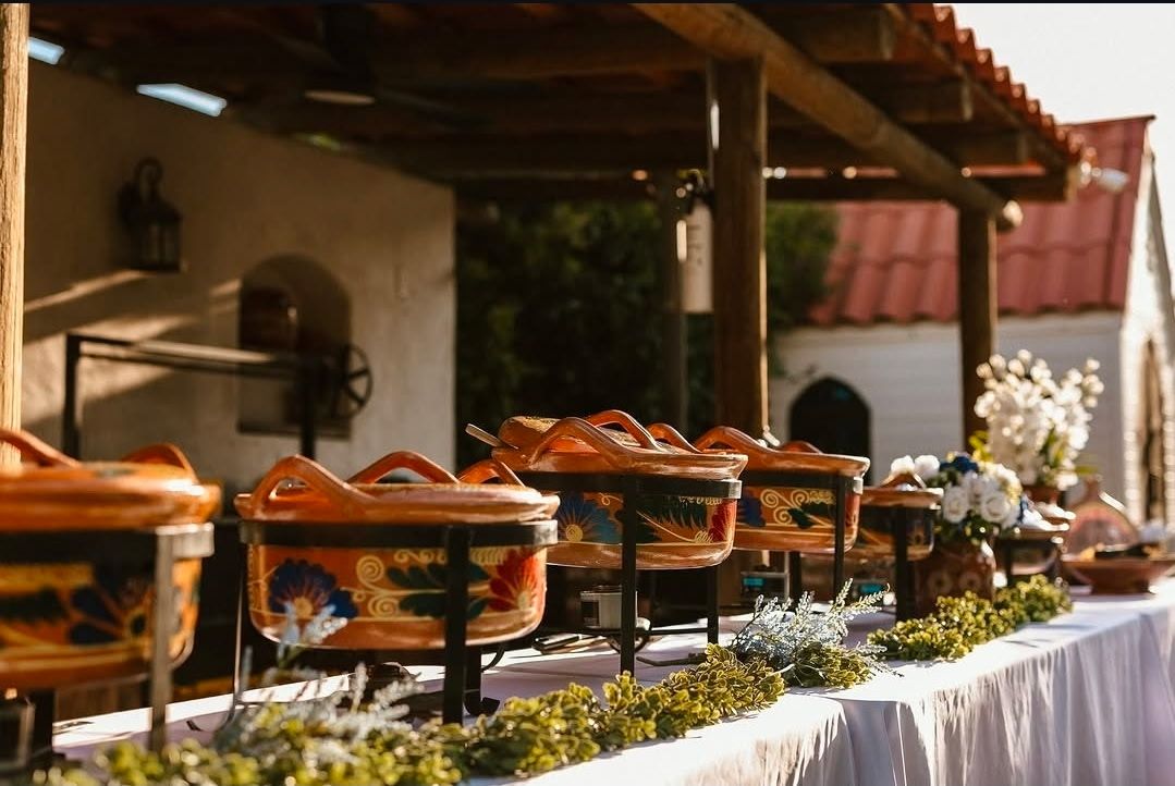 Catering line of clay cazuelas set for an event