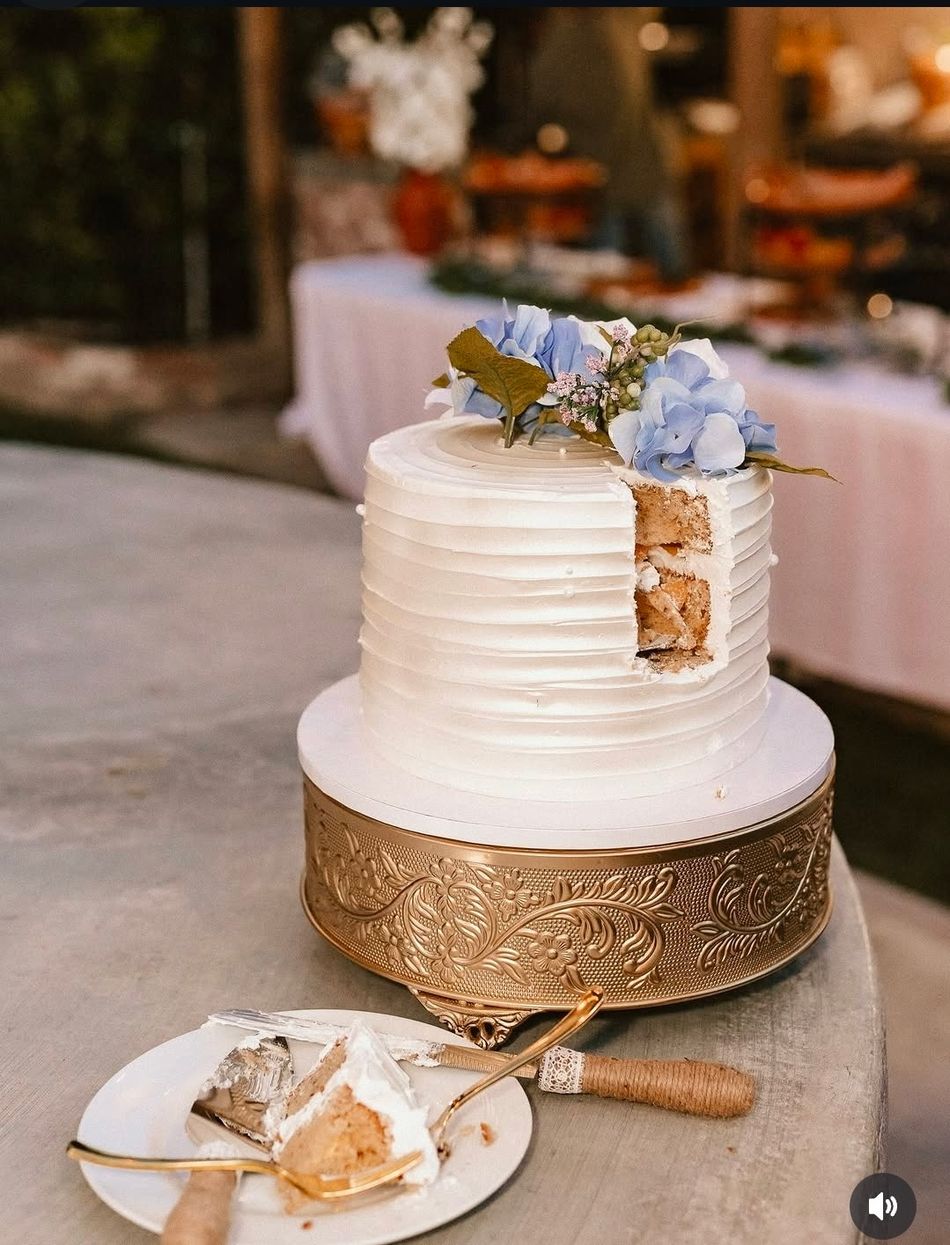 Tiered cake on a gold stand